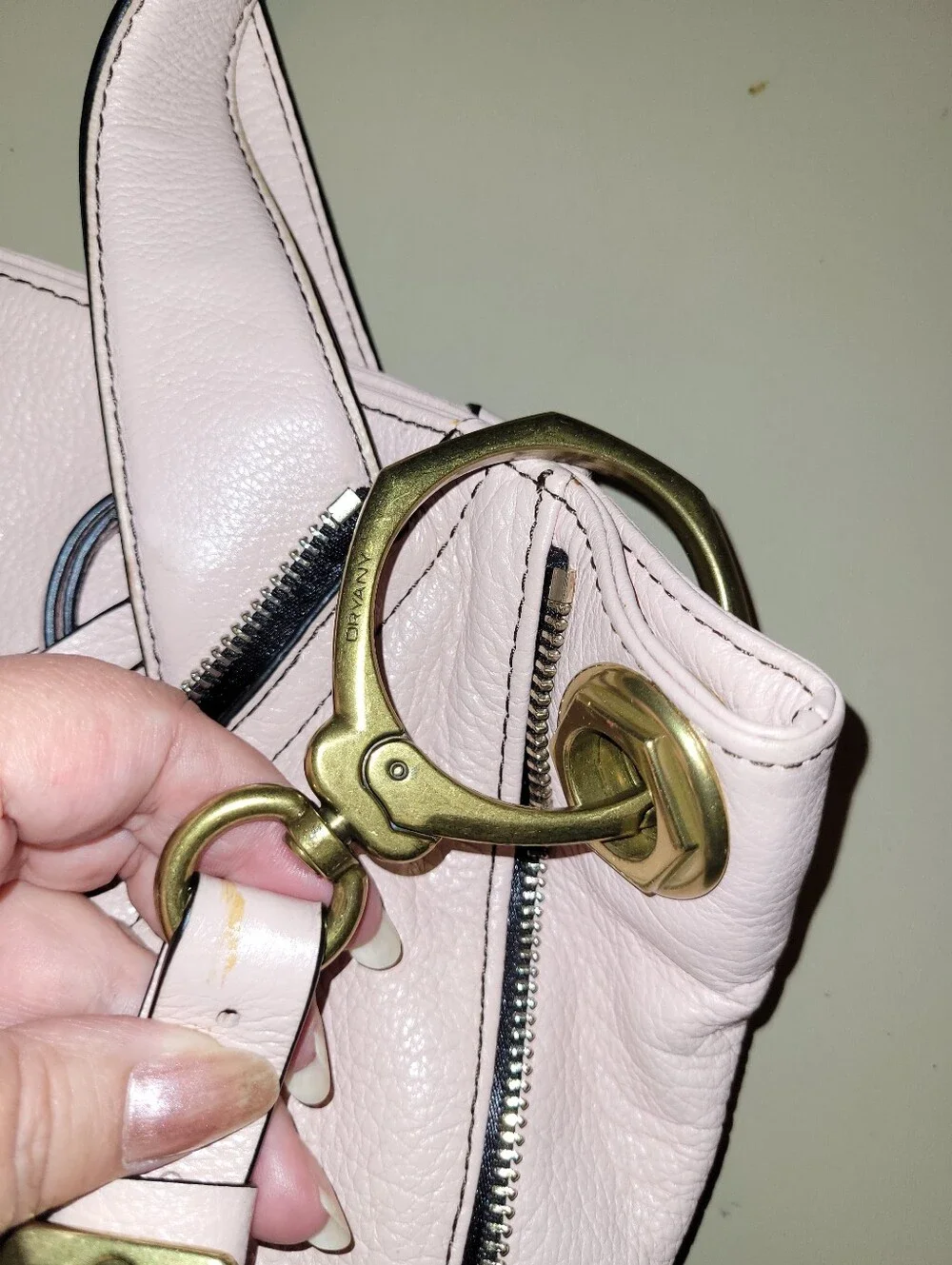 Oryany Blush Leather Shoulder Bag with Gold Turn-Lock Top Zip Bag.
